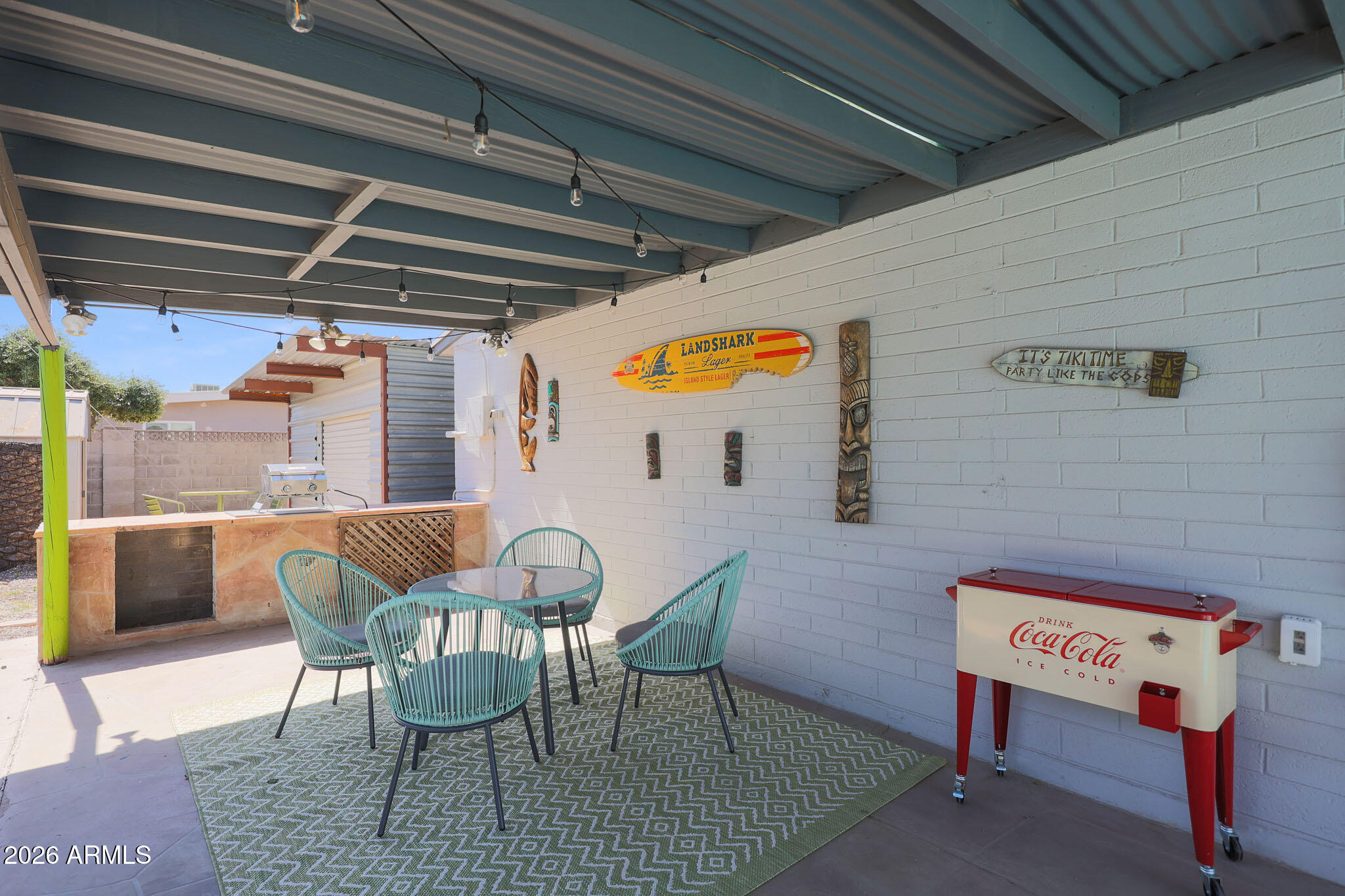 2201 East Marilyn Road Phoenix, AZ 85022 - Photo 44 of 47 a patio with table and chairs