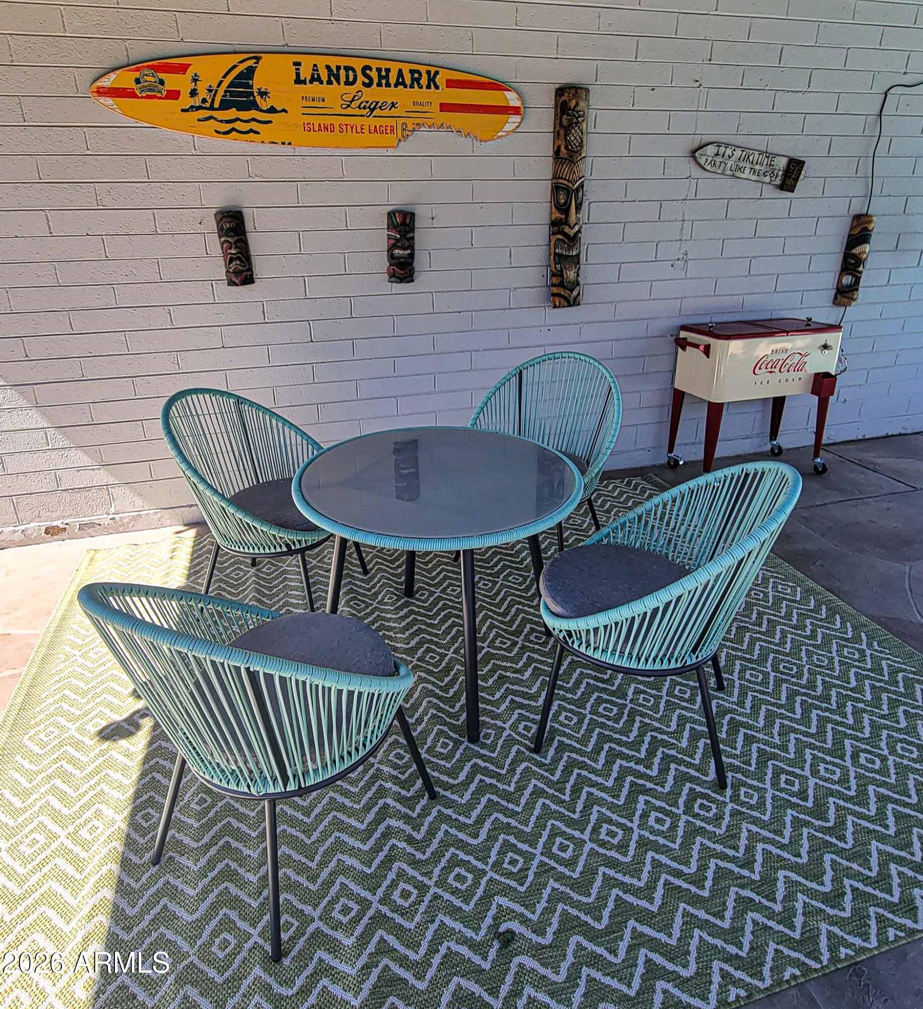 2201 East Marilyn Road Phoenix, AZ 85022 - Photo 45 of 47 a balcony with table and chairs