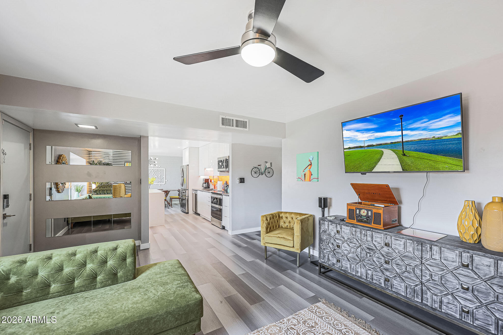 2201 East Marilyn Road Phoenix, AZ 85022 - Photo 7 of 47 a living room with furniture and a rug