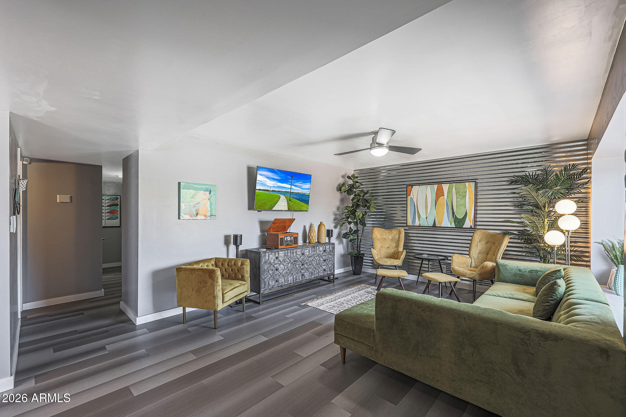 2201 East Marilyn Road Phoenix, AZ 85022 - Photo 8 of 47 a living room with furniture and a wooden floor