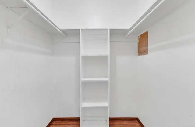 a view of an empty walk in closet