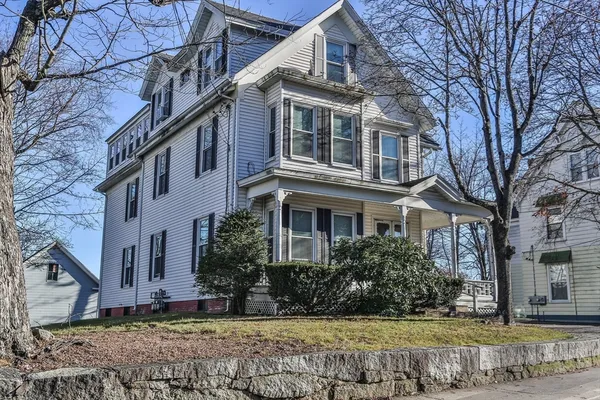 a view of a house with a garden