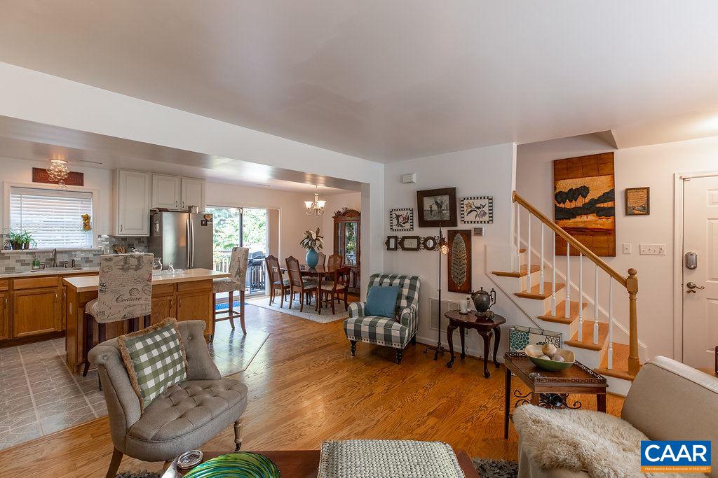 1229 Clover Ridge Place Charlottesville, VA 22901 - Photo 6 of 28 a living room with furniture and wooden floor