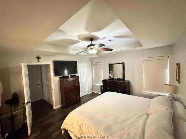 a bathroom with a double vanity sink mirror and