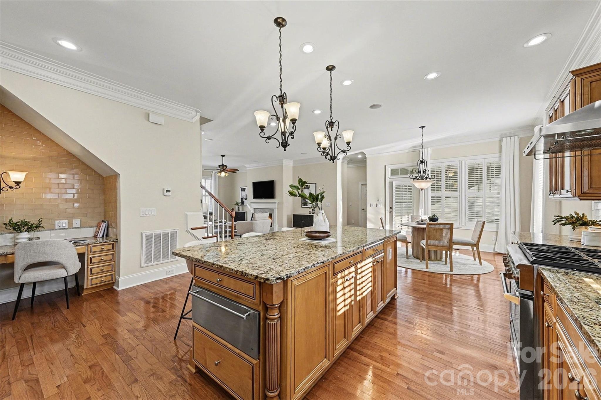 17531 Meadow Bottom Road Charlotte, NC 28277 - Photo 12 of 47 a living room with stainless steel appliances granite countertop furniture and wooden floor
