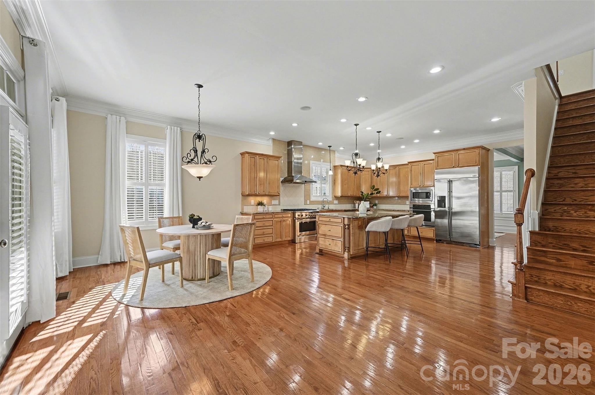 17531 Meadow Bottom Road Charlotte, NC 28277 - Photo 15 of 47 a living room with lots of furniture and kitchen view