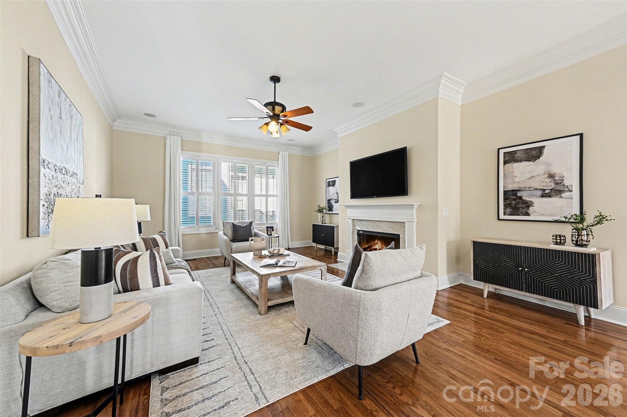 17531 Meadow Bottom Road Charlotte, NC 28277 - Photo 19 of 47 a living room with furniture fireplace and flat screen tv