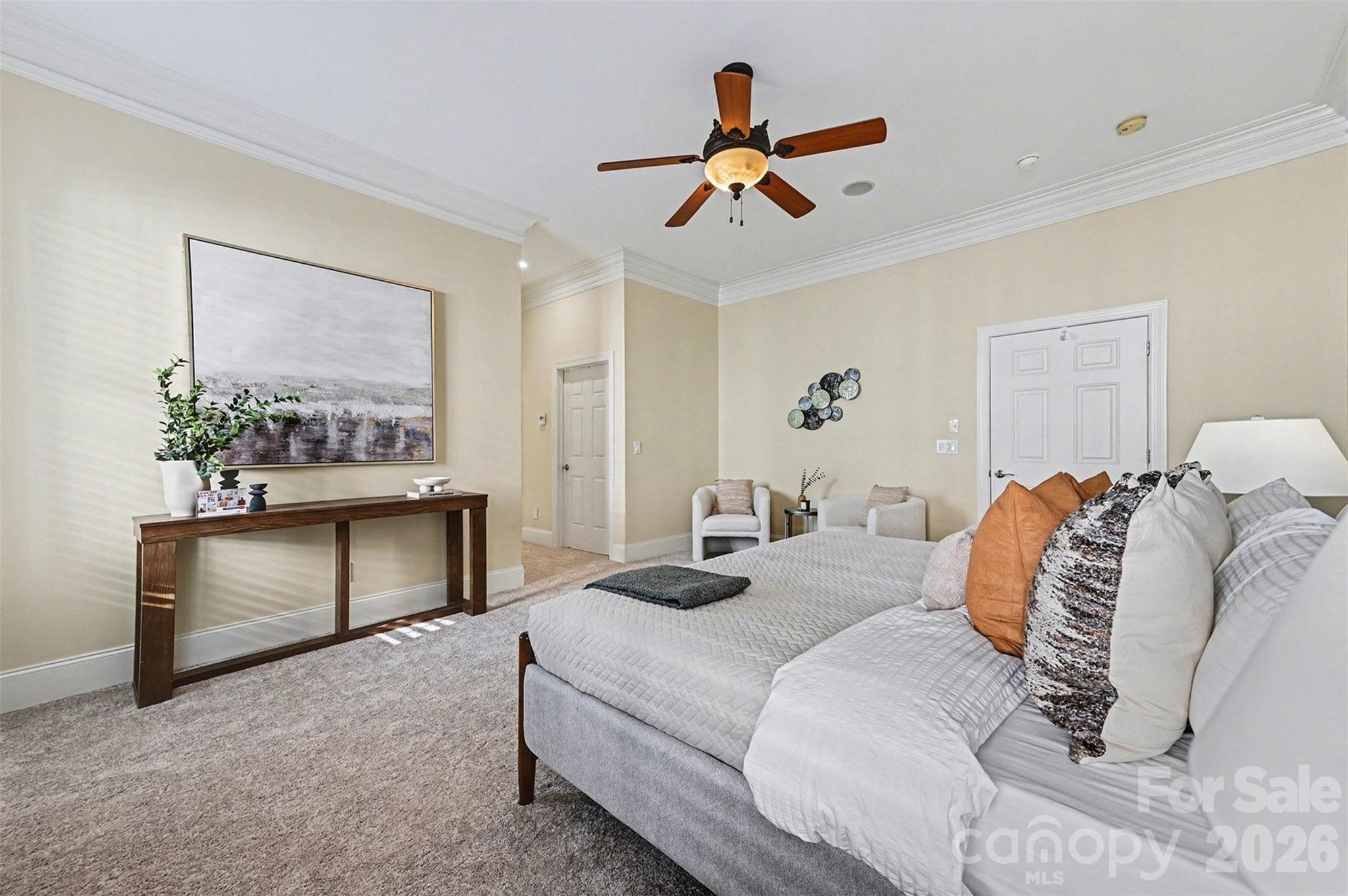 17531 Meadow Bottom Road Charlotte, NC 28277 - Photo 22 of 47 a bedroom with a bed and a chandelier