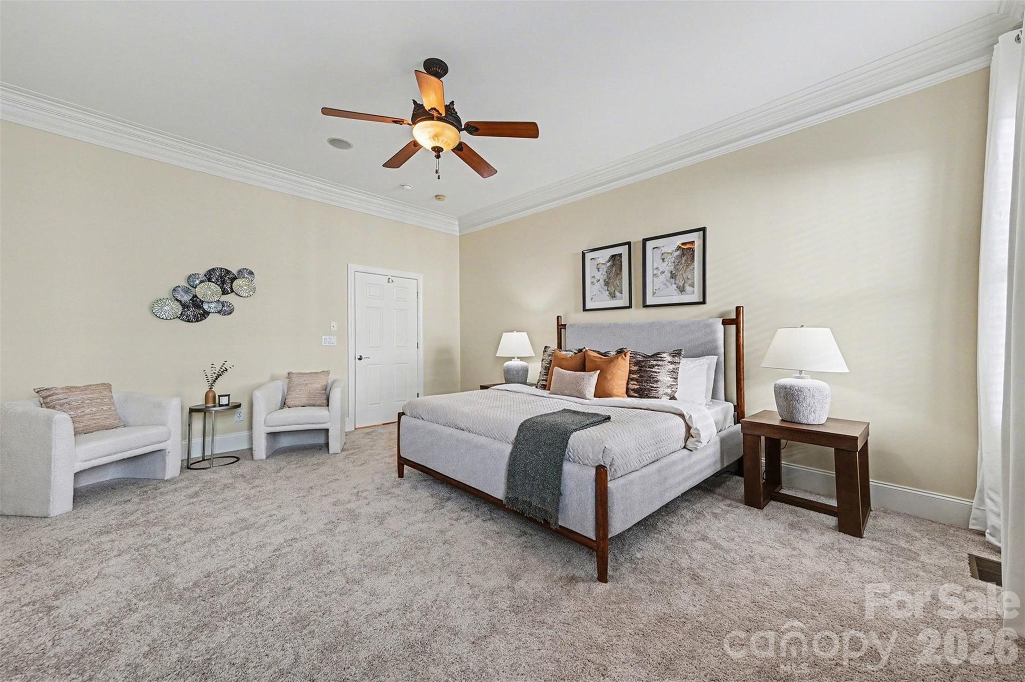 17531 Meadow Bottom Road Charlotte, NC 28277 - Photo 23 of 47 a bedroom with a bed and a chandelier