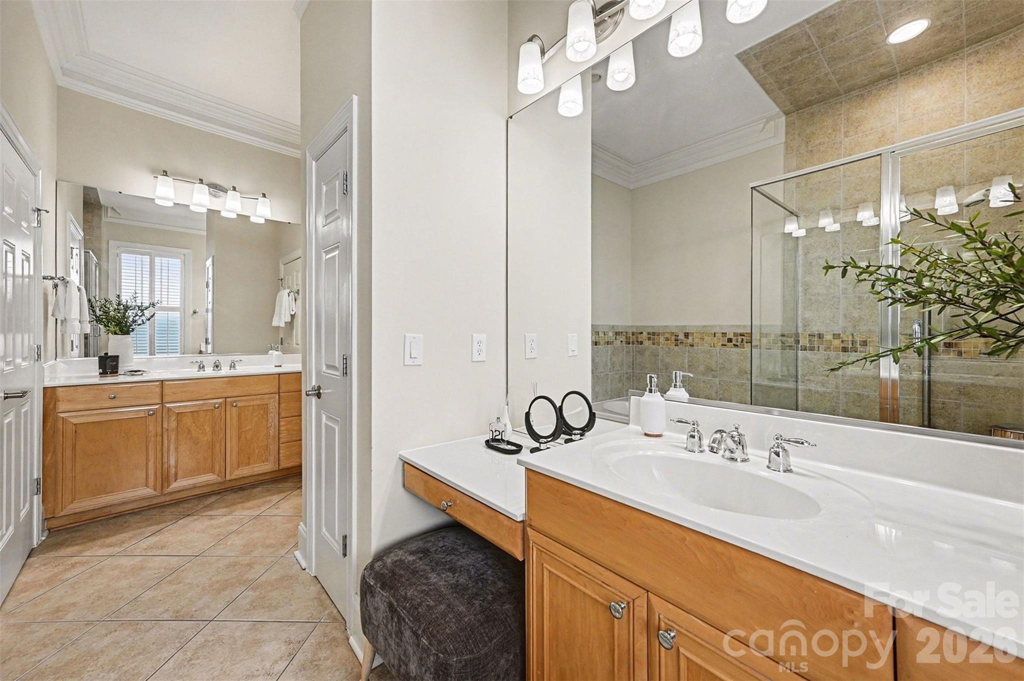 17531 Meadow Bottom Road Charlotte, NC 28277 - Photo 25 of 47 a bathroom with a sink double vanity and a mirror