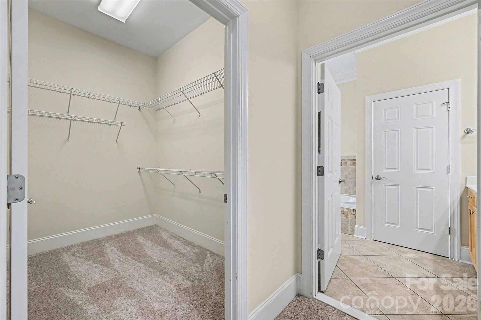 17531 Meadow Bottom Road Charlotte, NC 28277 - Photo 30 of 47 a view of a room & rack on the wall