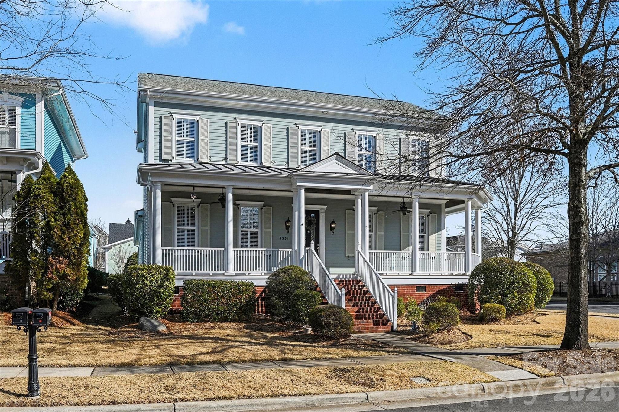 17531 Meadow Bottom Road Charlotte, NC 28277 - Photo 3 of 47 a front view of a house with a yard