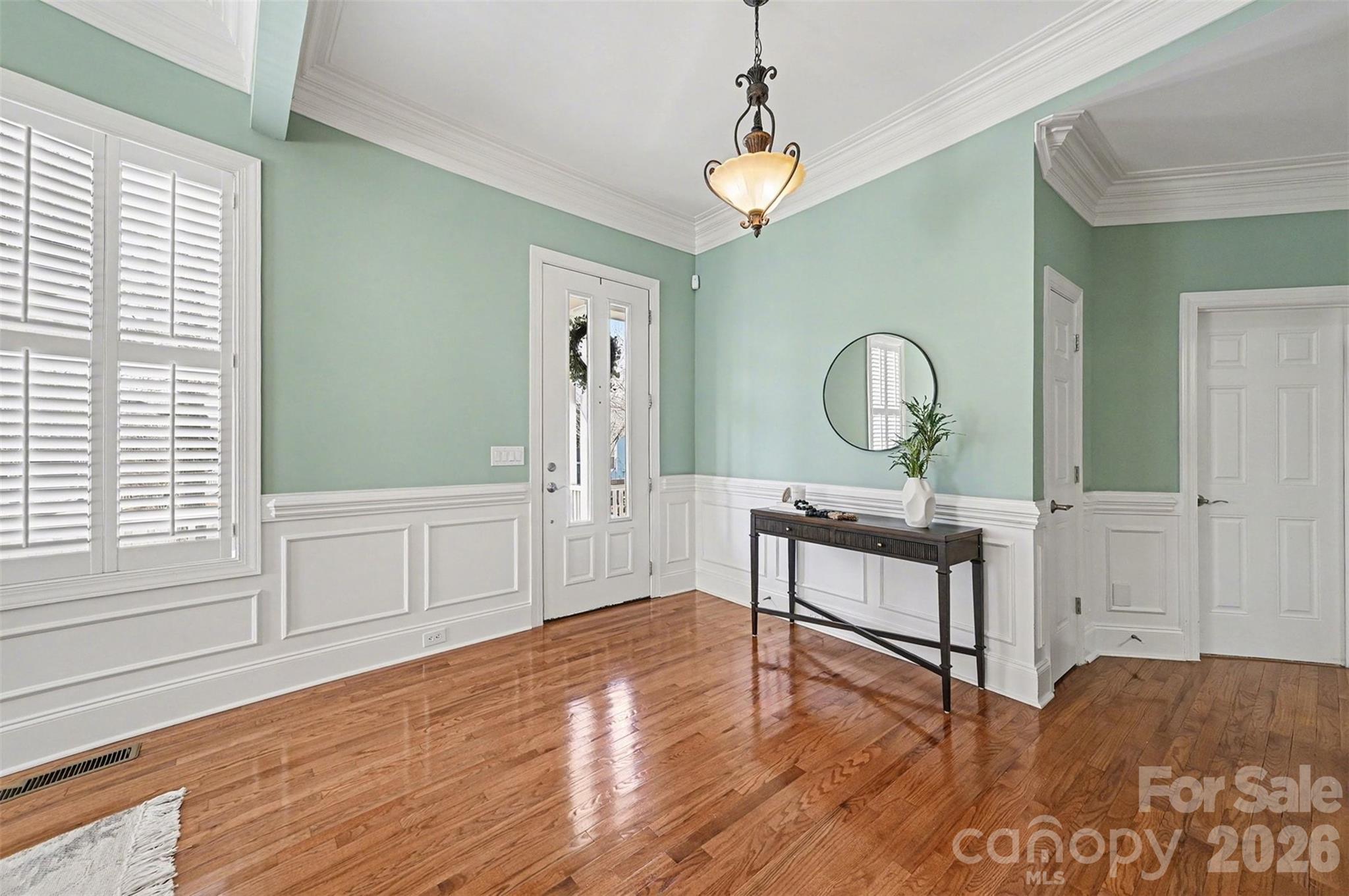 17531 Meadow Bottom Road Charlotte, NC 28277 - Photo 6 of 47 a living room with furniture and a wooden floor