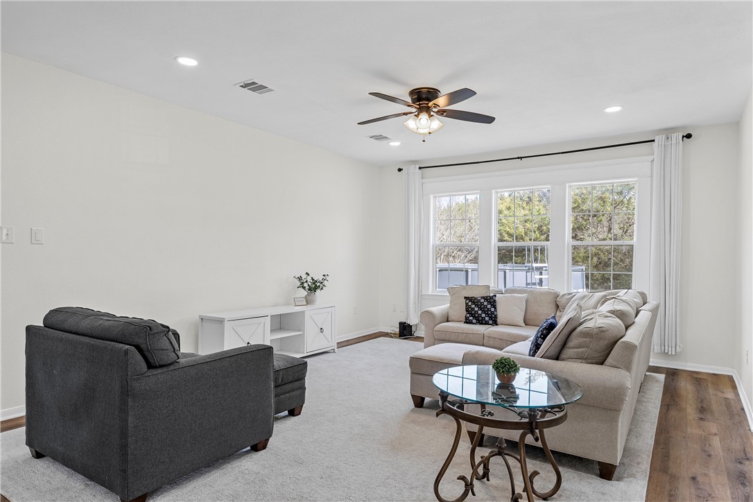 15966 Old China Spring Road China Spring, TX 76633 - Photo 12 of 45 a living room with furniture and a large window