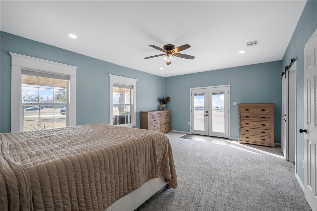 15966 Old China Spring Road China Spring, TX 76633 - Photo 24 of 45 a spacious bedroom with a large bed and a dresser