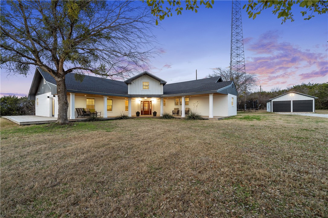 15966 Old China Spring Road China Spring, TX 76633 - Photo 3 of 45 a front view of a house with a yard