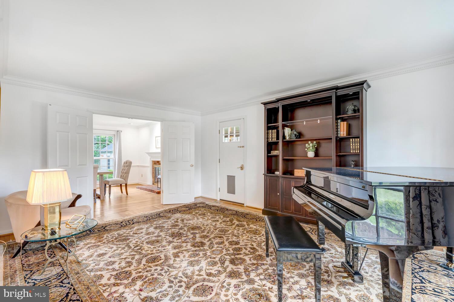 723 Forest Park Road Great Falls, VA 22066 - Photo 13 of 71 a living room with furniture a rug and a window