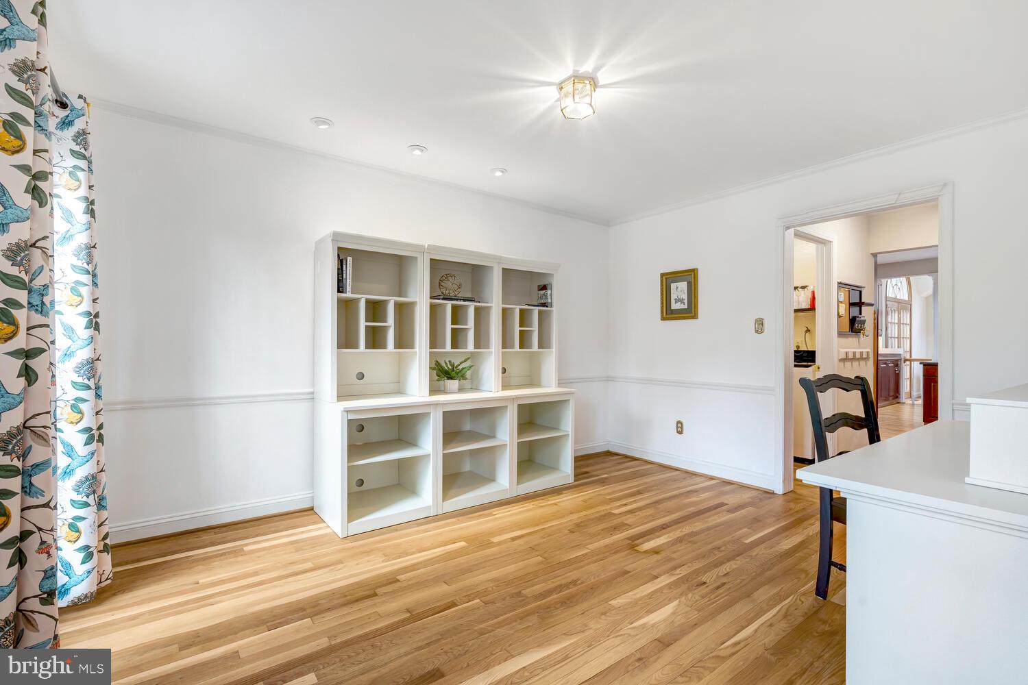 723 Forest Park Road Great Falls, VA 22066 - Photo 15 of 71 a view of a bedroom with wooden floor and closet