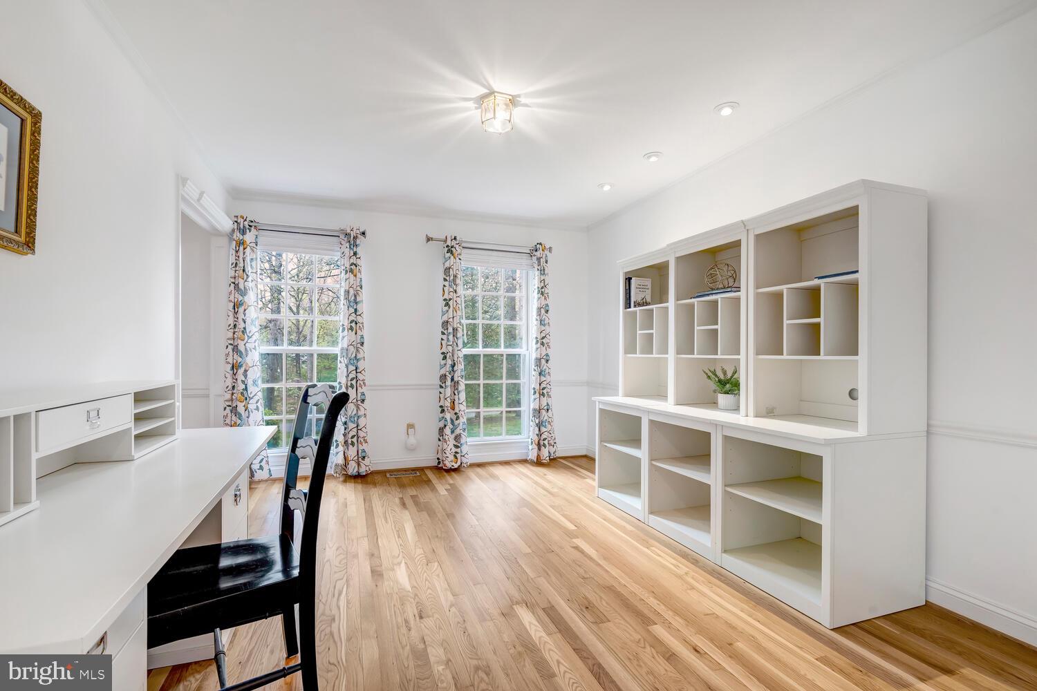 723 Forest Park Road Great Falls, VA 22066 - Photo 16 of 71 a view of a workspace with furniture and a window