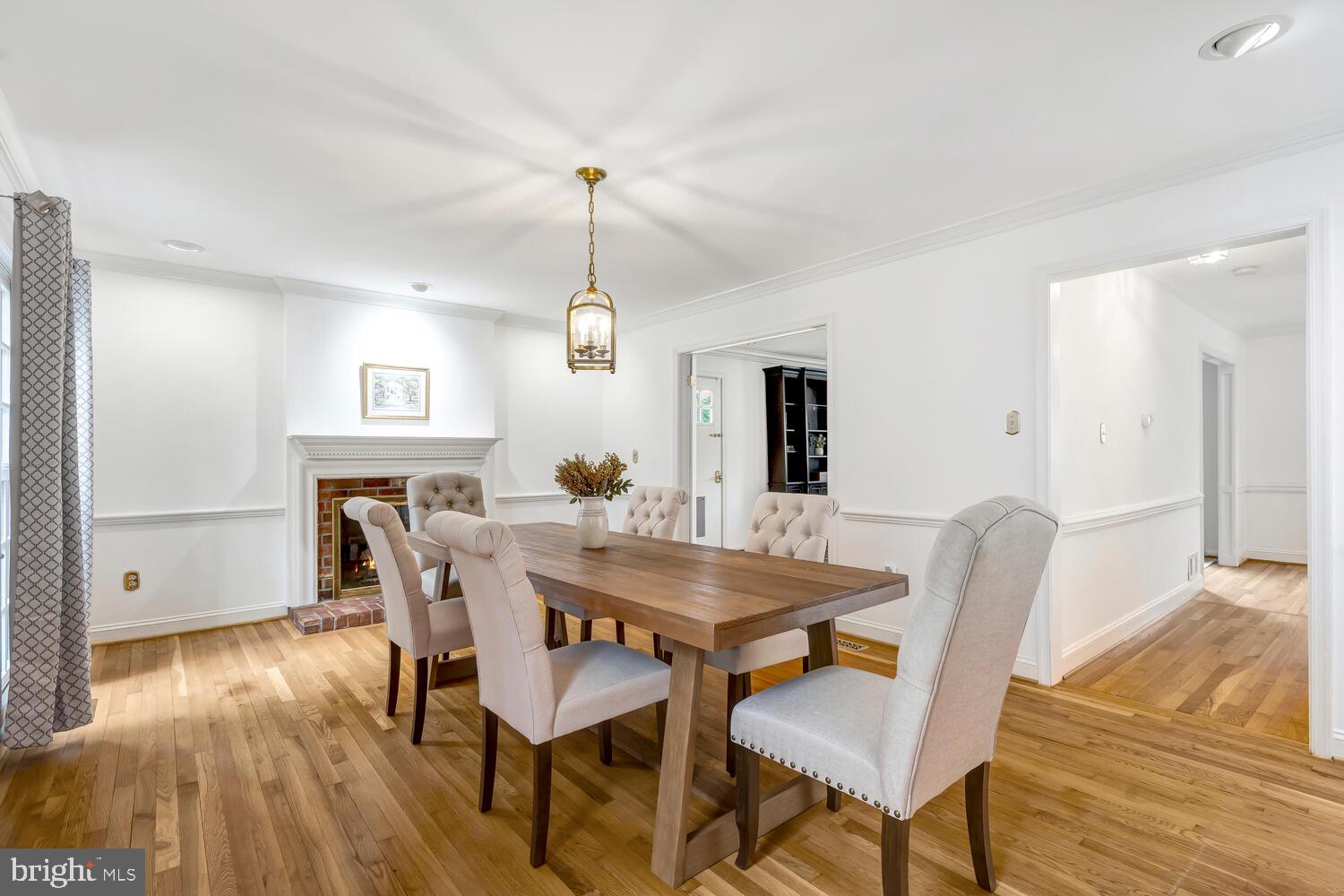 723 Forest Park Road Great Falls, VA 22066 - Photo 17 of 71 a view of a dining room with furniture window and wooden floor
