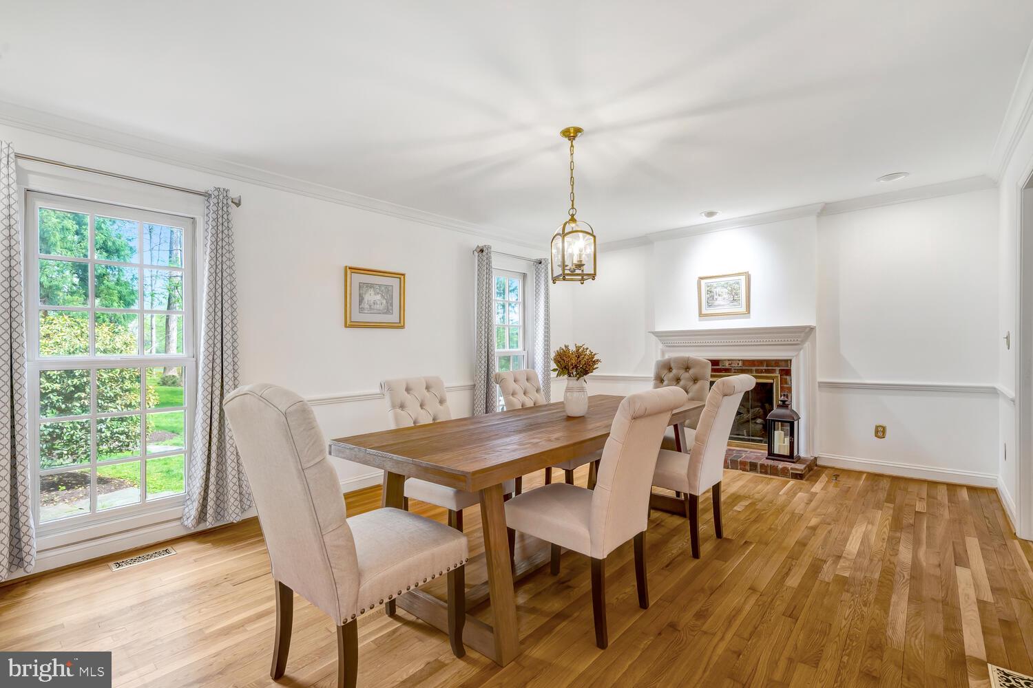723 Forest Park Road Great Falls, VA 22066 - Photo 18 of 71 a view of a dining room with furniture window and wooden floor