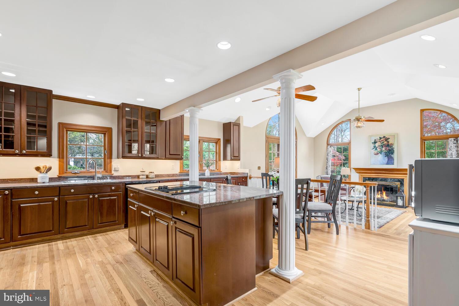 723 Forest Park Road Great Falls, VA 22066 - Photo 20 of 71 a kitchen with stainless steel appliances granite countertop sink stove top oven and cabinets