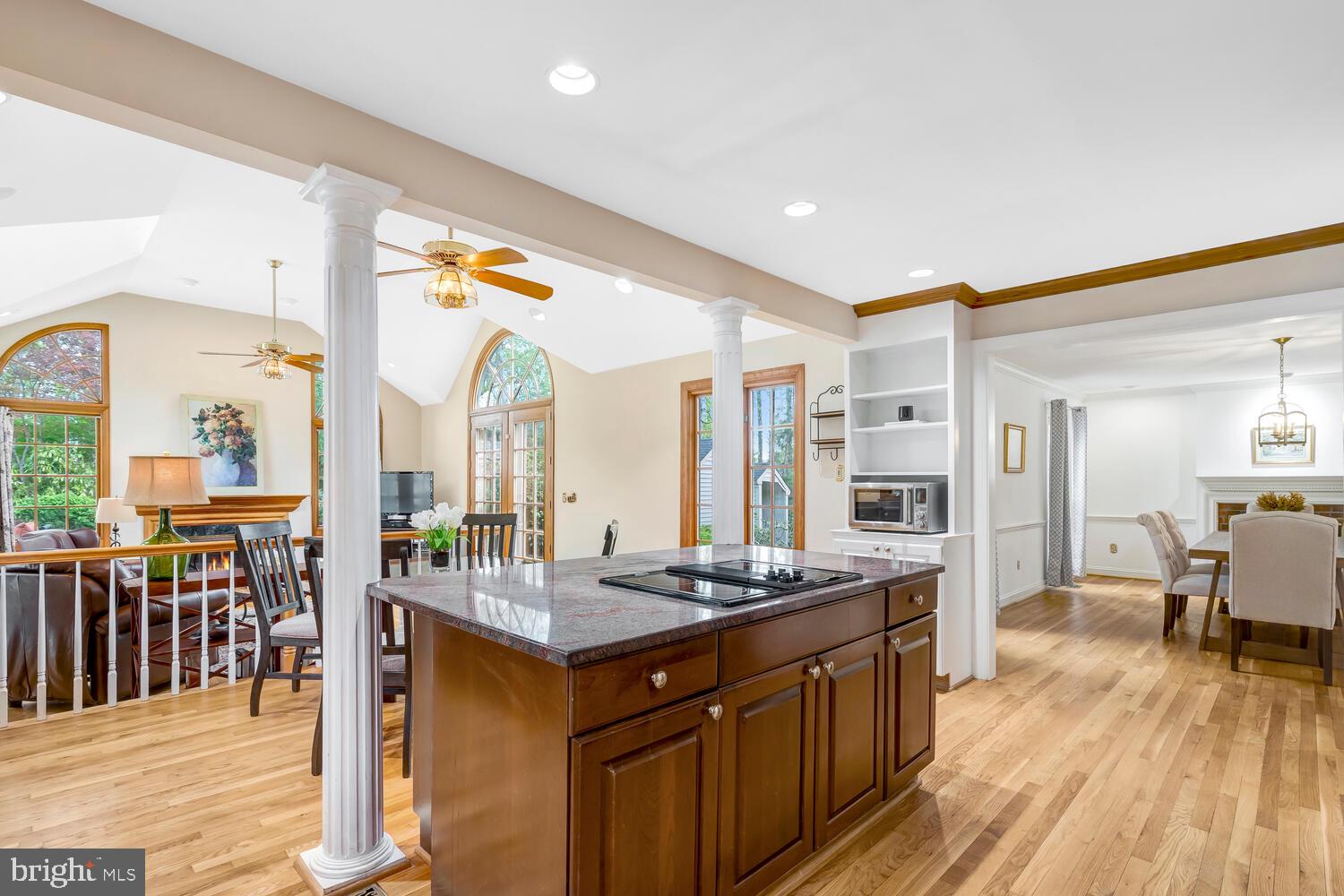 723 Forest Park Road Great Falls, VA 22066 - Photo 67 of 71 a kitchen with stainless steel appliances granite countertop a sink stove and wooden cabinets