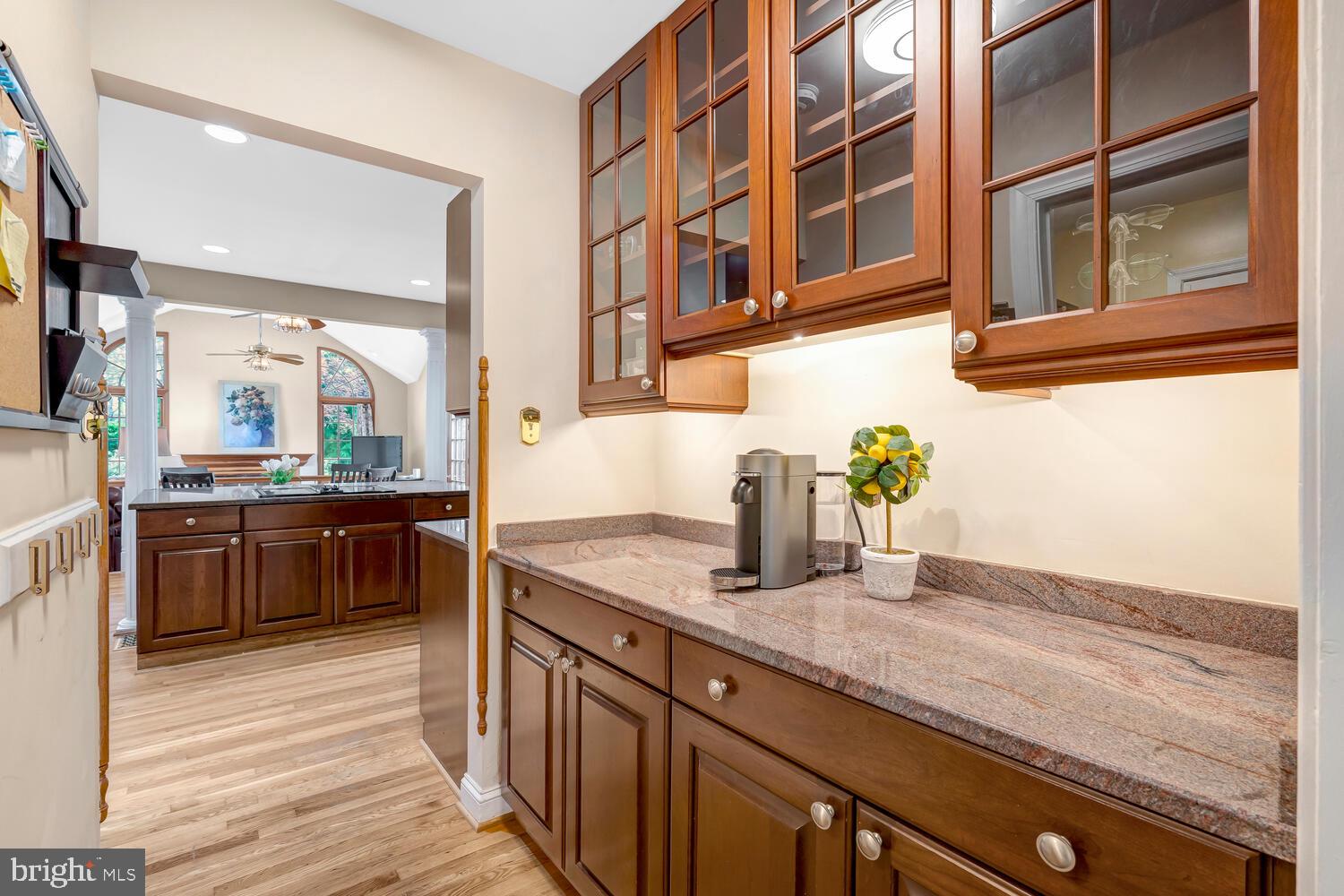 723 Forest Park Road Great Falls, VA 22066 - Photo 24 of 71 a kitchen with stainless steel appliances granite countertop a sink and a stove