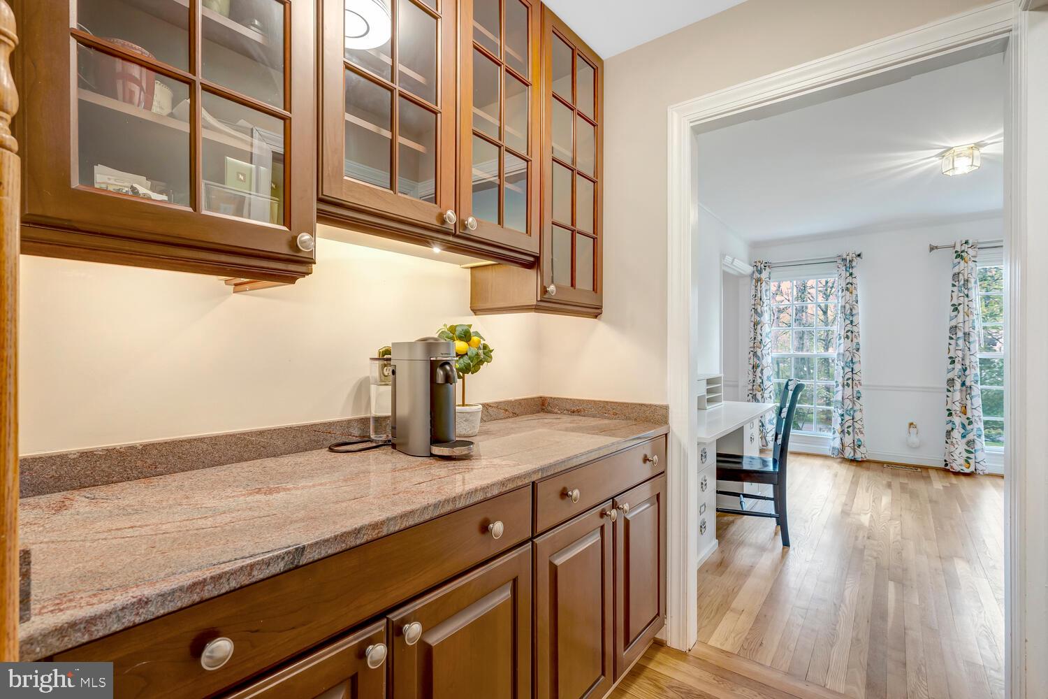 723 Forest Park Road Great Falls, VA 22066 - Photo 25 of 71 a kitchen with stainless steel appliances granite countertop wooden cabinets and a granite counter tops
