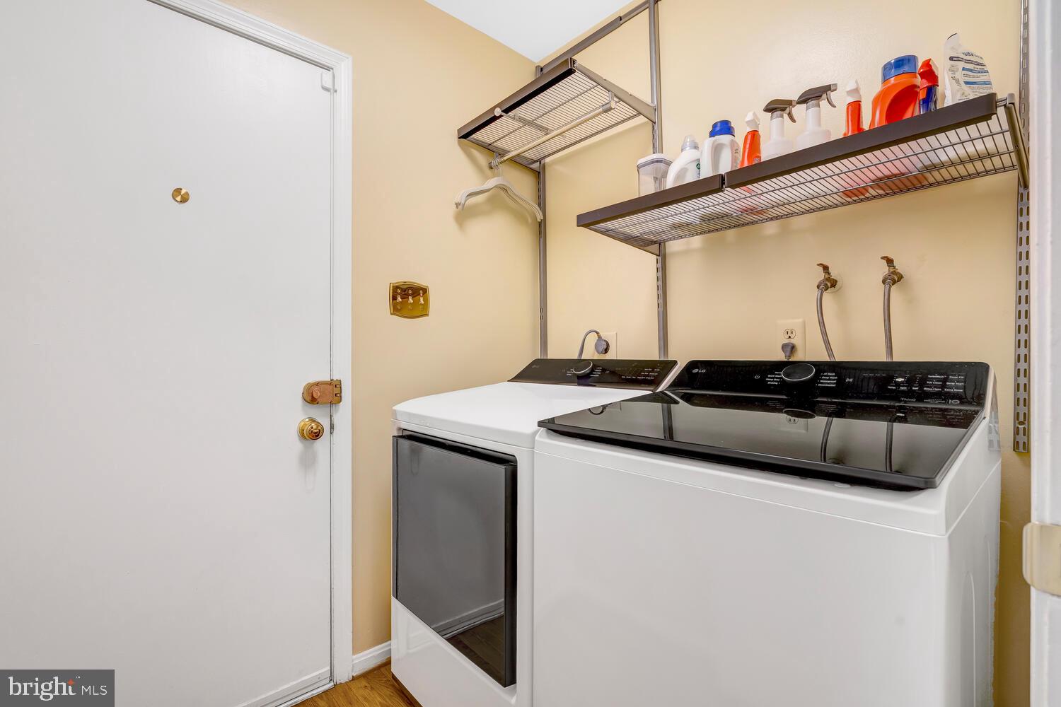 723 Forest Park Road Great Falls, VA 22066 - Photo 26 of 71 a utility room with dryer and washer