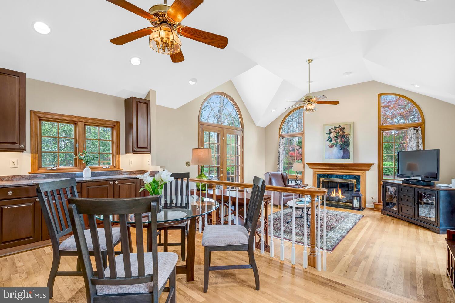 723 Forest Park Road Great Falls, VA 22066 - Photo 28 of 71 a view of a dining room with furniture a chandelier and wooden floor