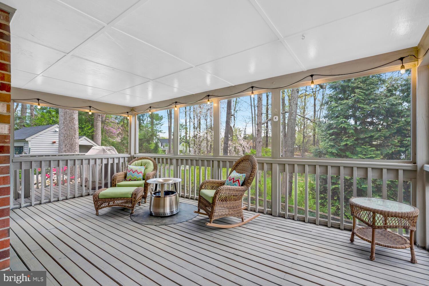 723 Forest Park Road Great Falls, VA 22066 - Photo 47 of 71 a view of a balcony with chairs and wooden floor
