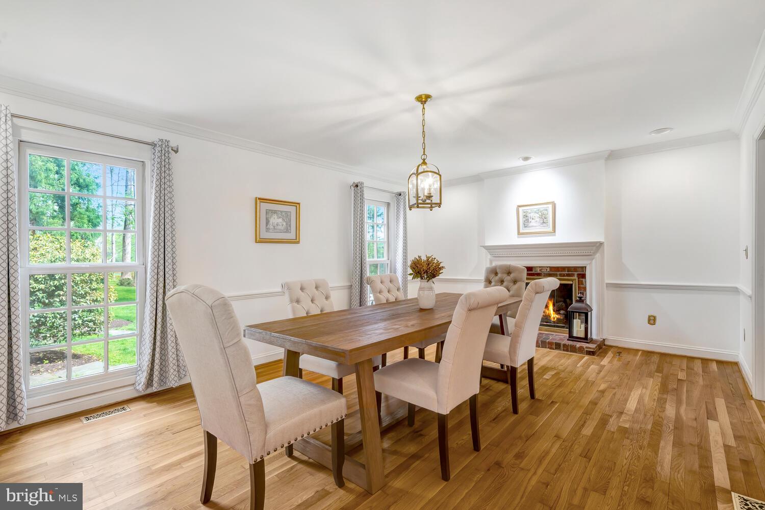 723 Forest Park Road Great Falls, VA 22066 - Photo 5 of 71 a view of a dining room with furniture window and wooden floor