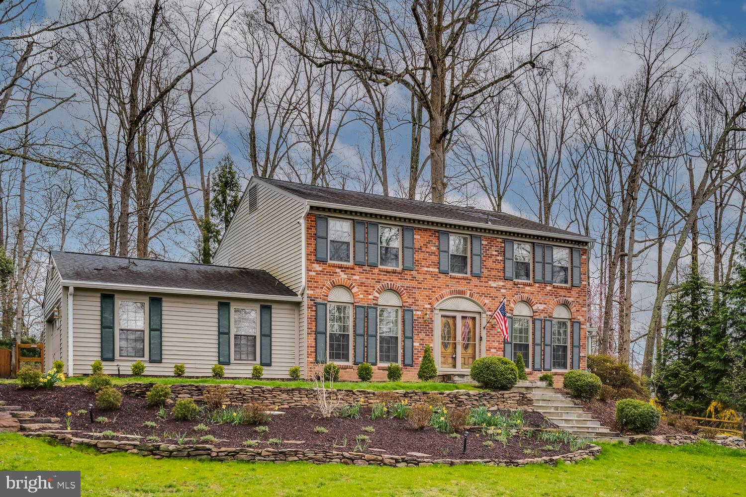 723 Forest Park Road Great Falls, VA 22066 - Photo 51 of 71 a front view of a house with yard and green space