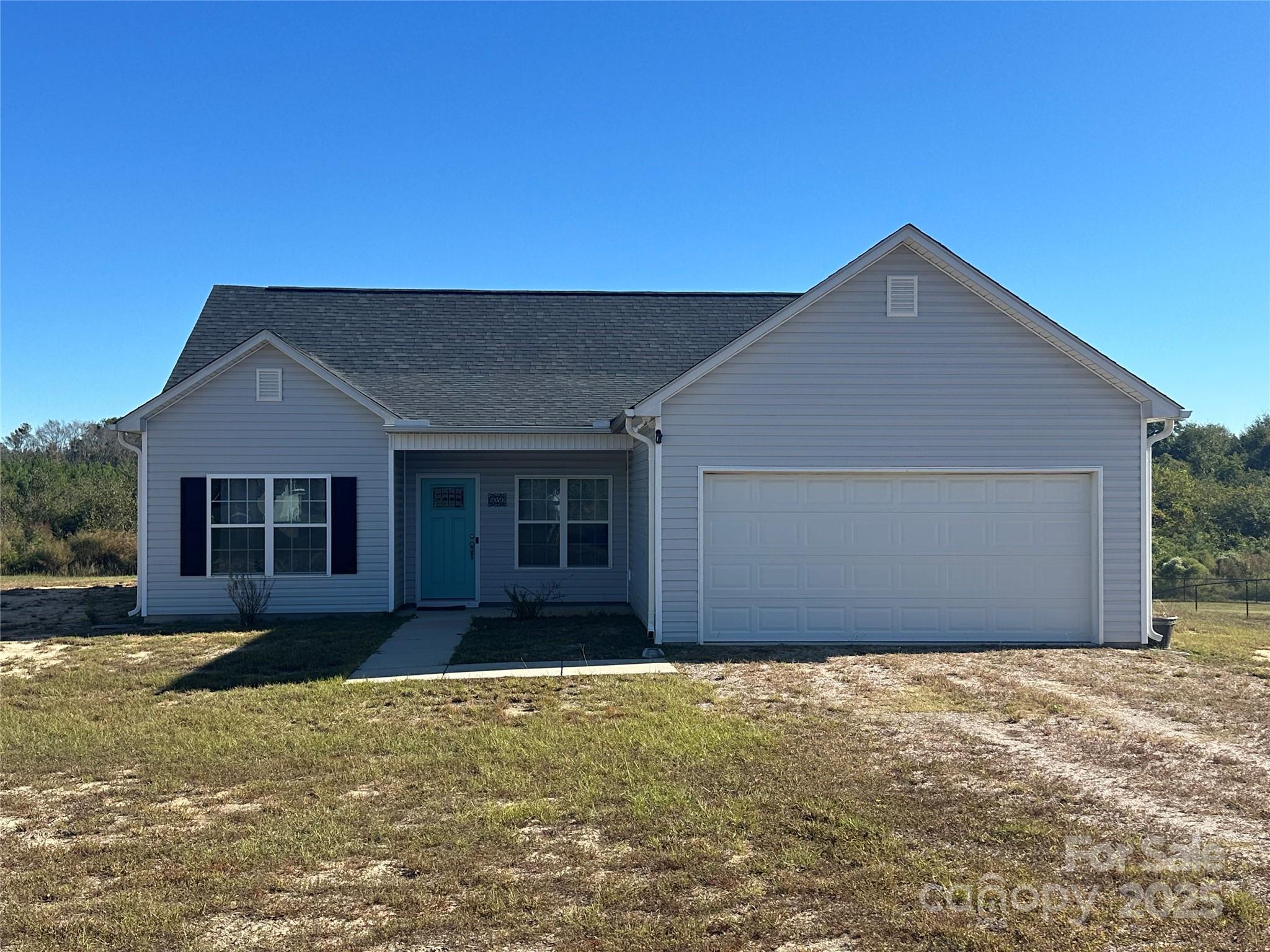 6050 White Plaines Pageland, SC 29728 - Photo 2 of 17 front view of house with a yard