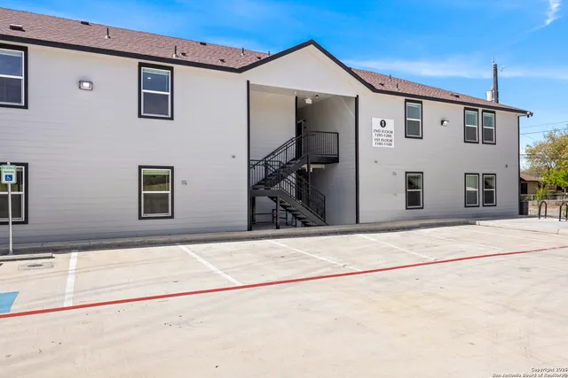 a front view of a house with a garage