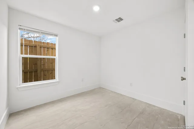 an empty room with a window