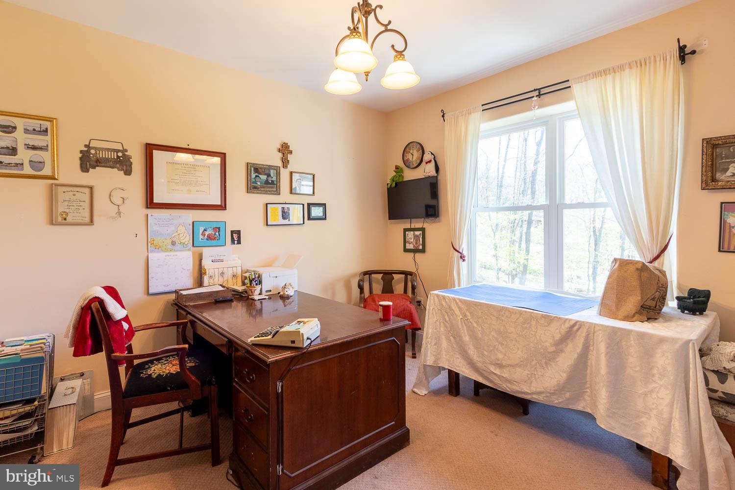 321 Mount Nittany Road Lemont, PA 16851 - Photo 17 of 43 a living room with furniture and a window