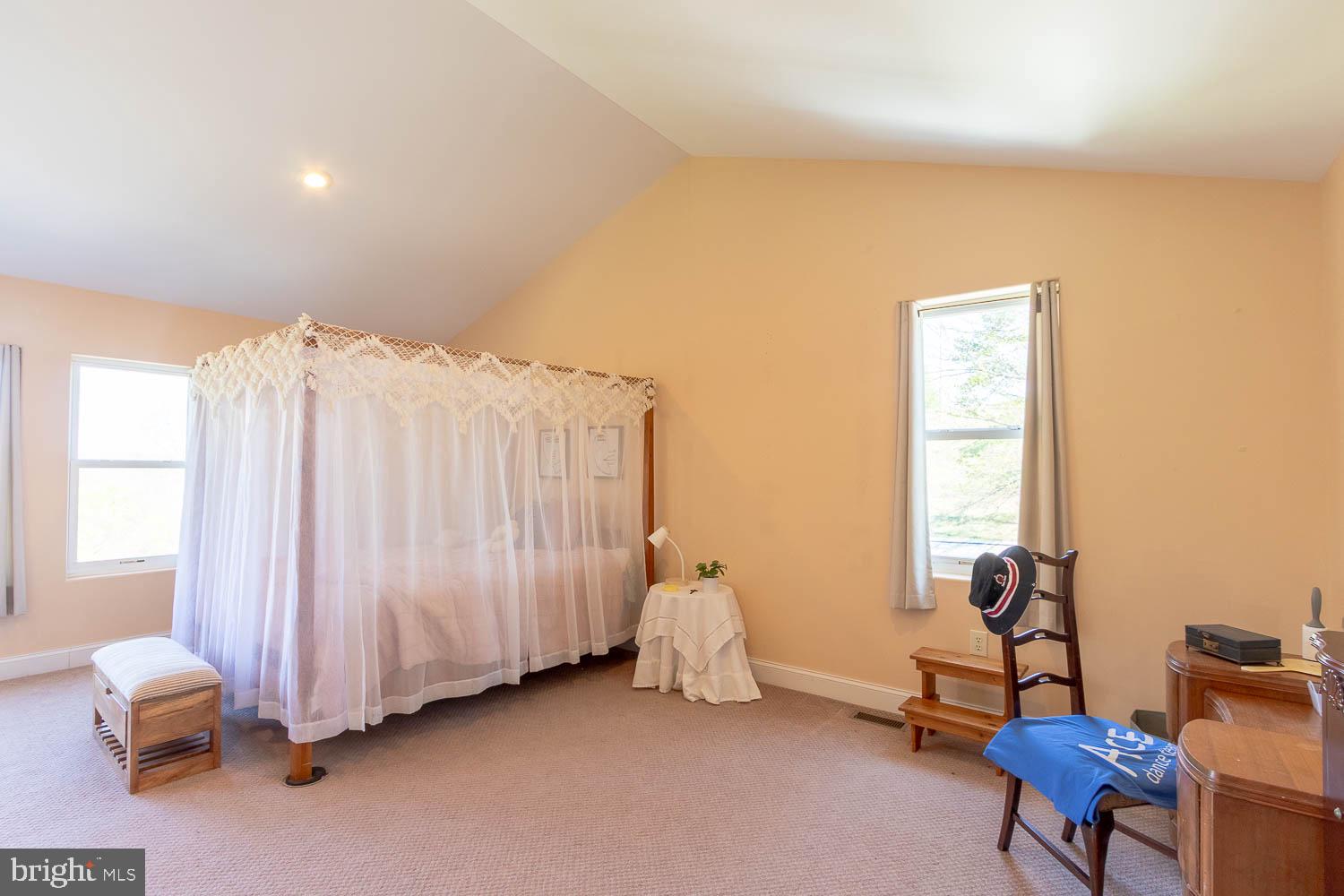 321 Mount Nittany Road Lemont, PA 16851 - Photo 22 of 43 a room with furniture and a window
