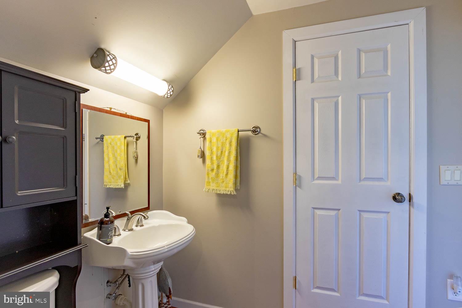 321 Mount Nittany Road Lemont, PA 16851 - Photo 25 of 43 a bathroom with a sink and a mirror