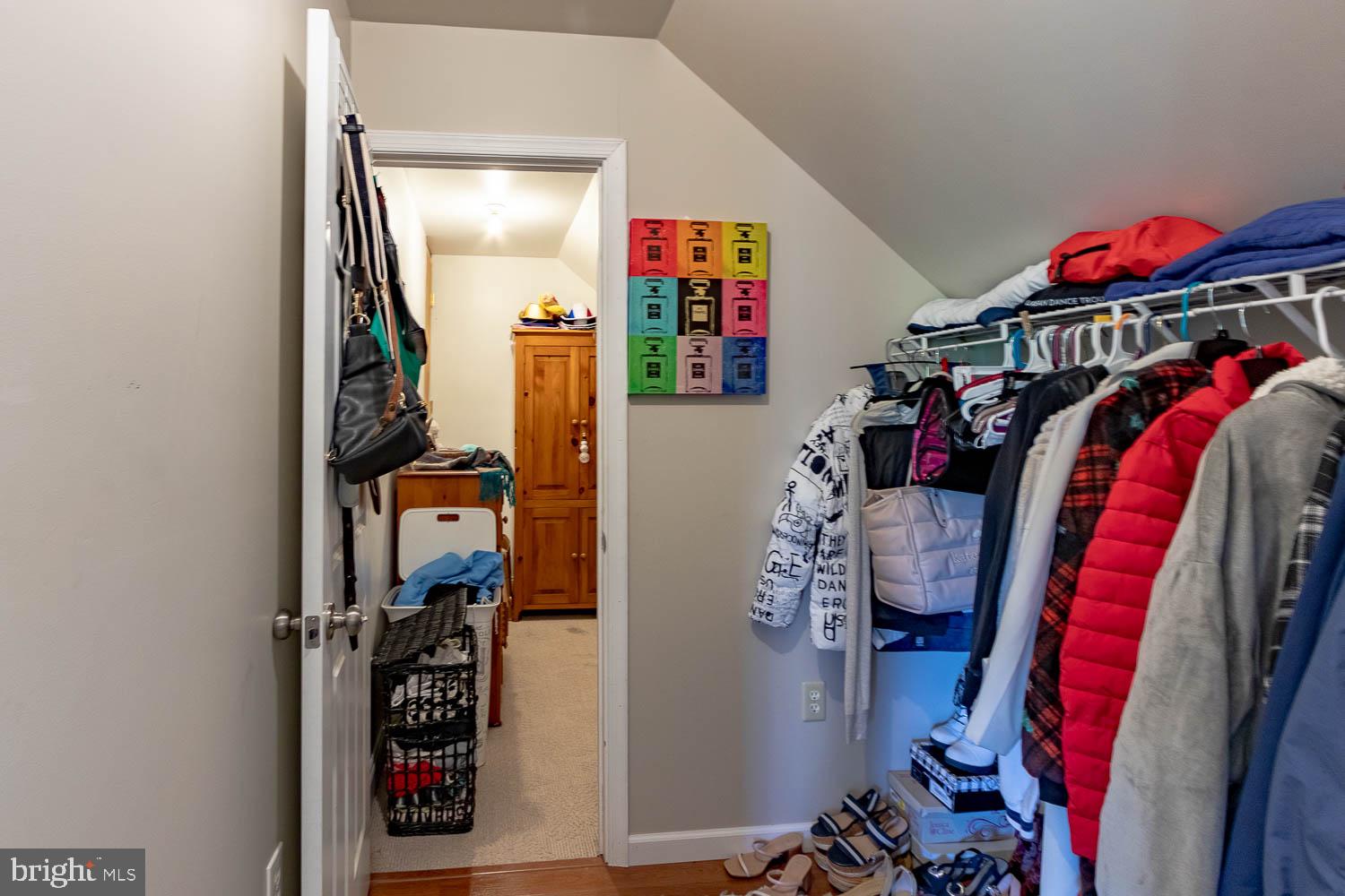 321 Mount Nittany Road Lemont, PA 16851 - Photo 27 of 43 a view of walk in closet with clothes and shoes