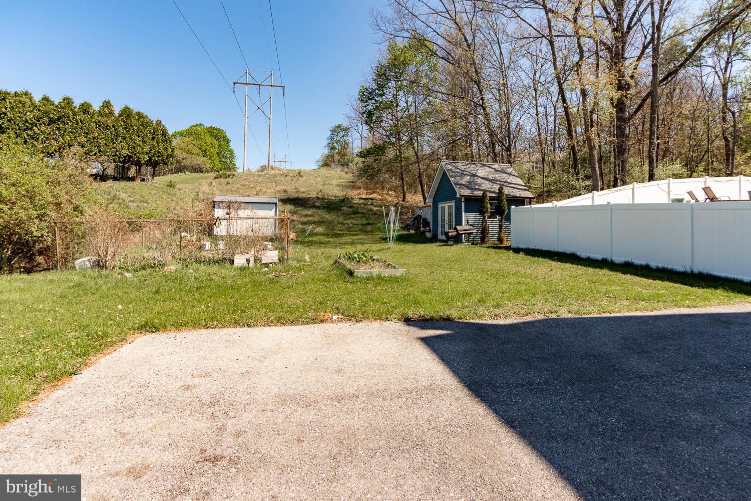 321 Mount Nittany Road Lemont, PA 16851 - Photo 39 of 43 a view of a house with a yard