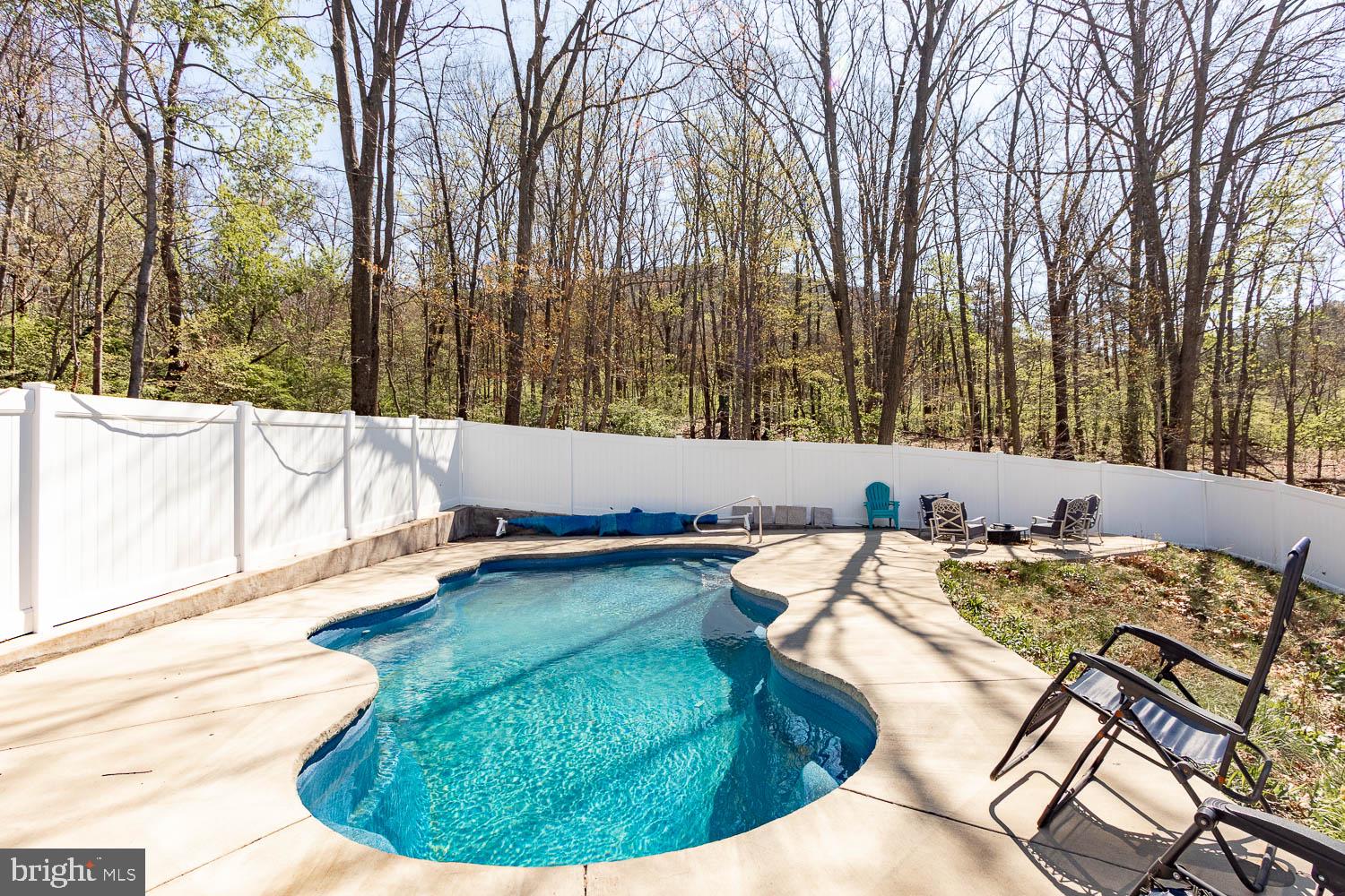 321 Mount Nittany Road Lemont, PA 16851 - Photo 40 of 43 a view of a swimming pool with an outdoor seating