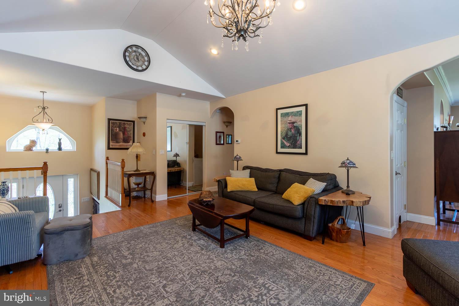 321 Mount Nittany Road Lemont, PA 16851 - Photo 4 of 43 a living room with furniture and wooden floor