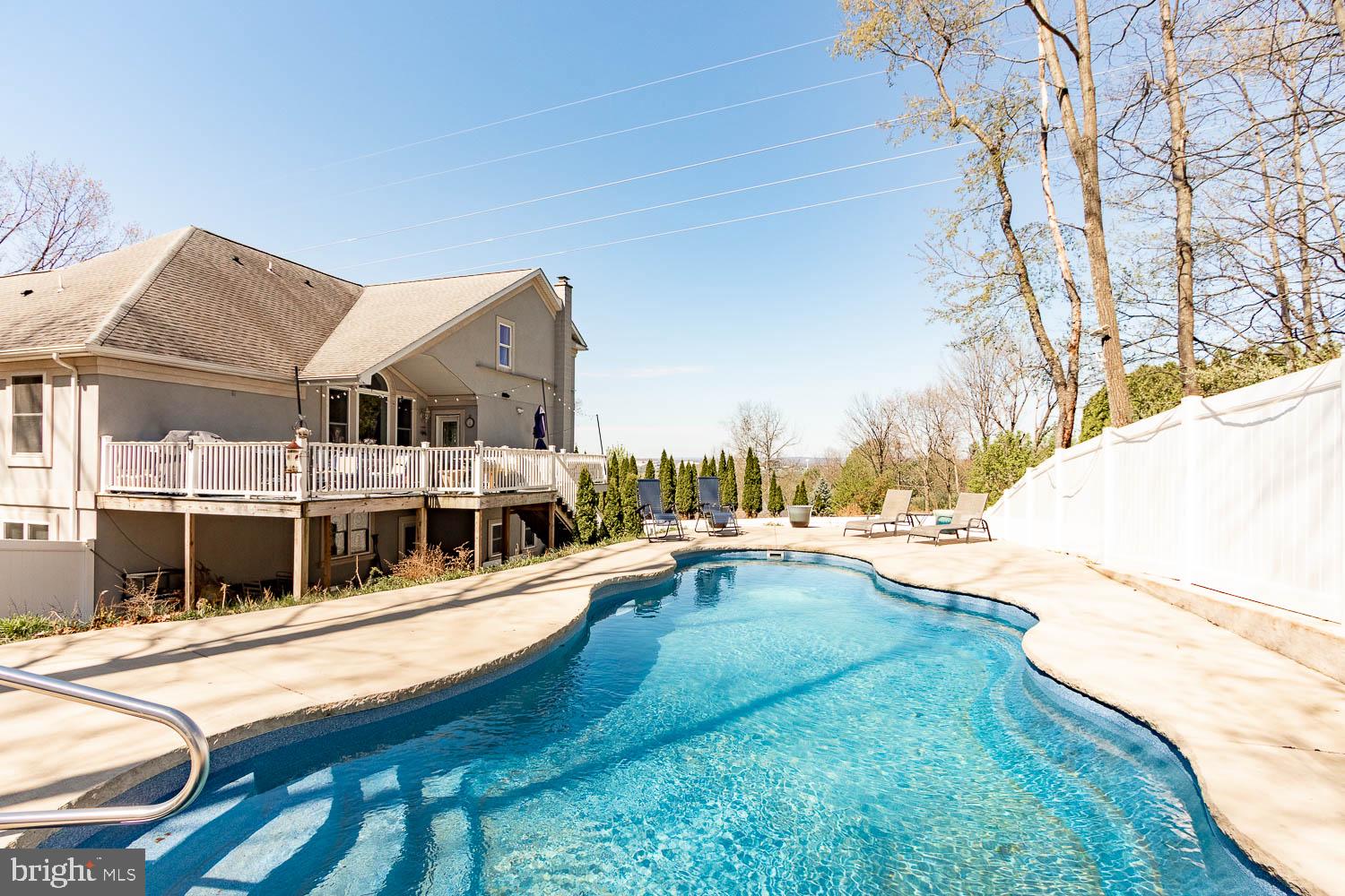 321 Mount Nittany Road Lemont, PA 16851 - Photo 42 of 43 a view of a house with swimming pool
