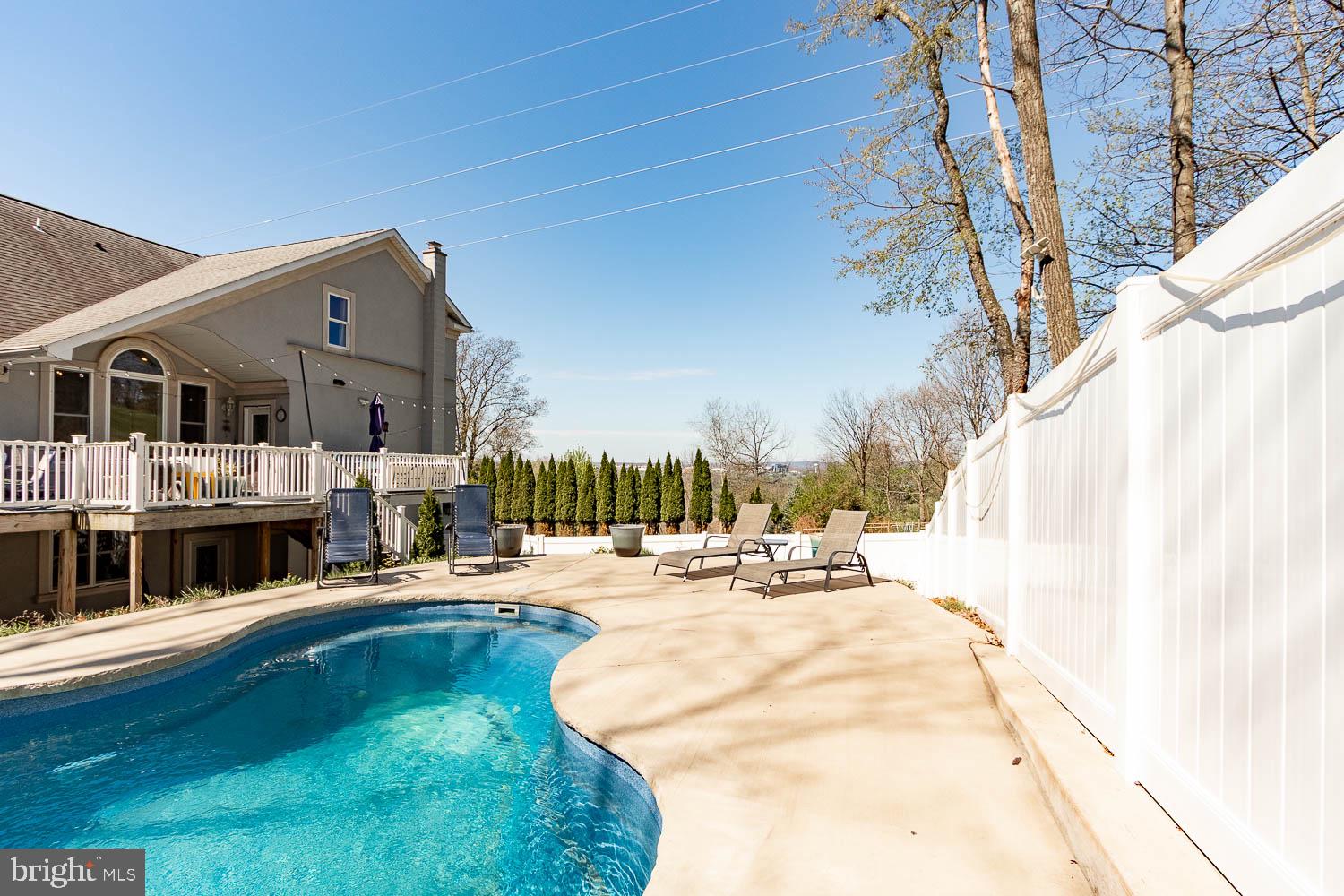 321 Mount Nittany Road Lemont, PA 16851 - Photo 43 of 43 a swimming pool with outdoor seating and yard
