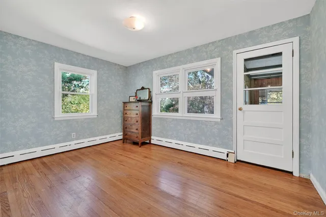 an empty room with windows