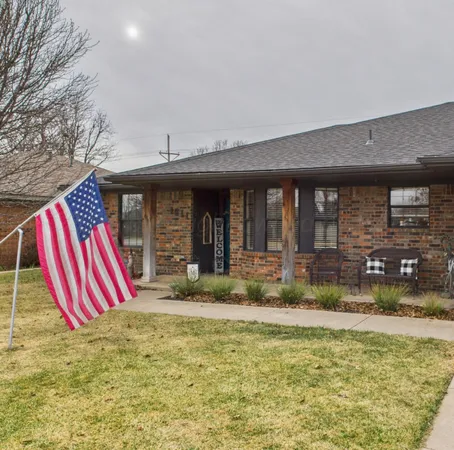 a view of a house with a swimming pool