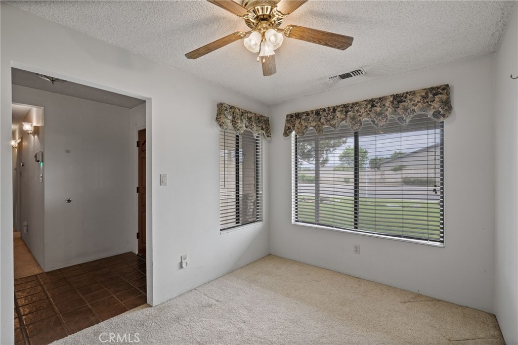 2065 Jenkins Road Bakersfield, CA 93314 - Photo 21 of 59 a view of an empty room with a window