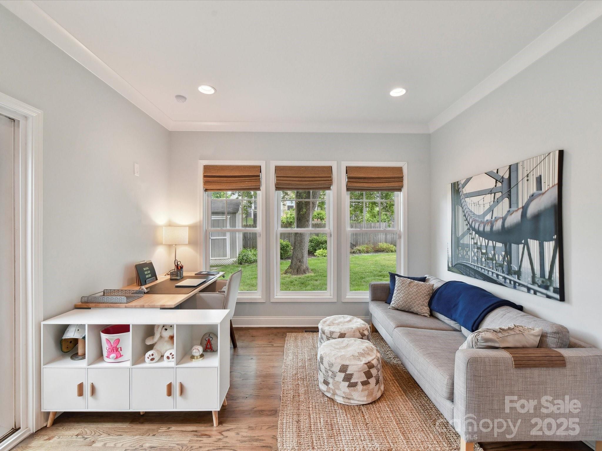335 Greystone Road Charlotte, NC 28209 - Photo 14 of 37 a bedroom with furniture and a large window